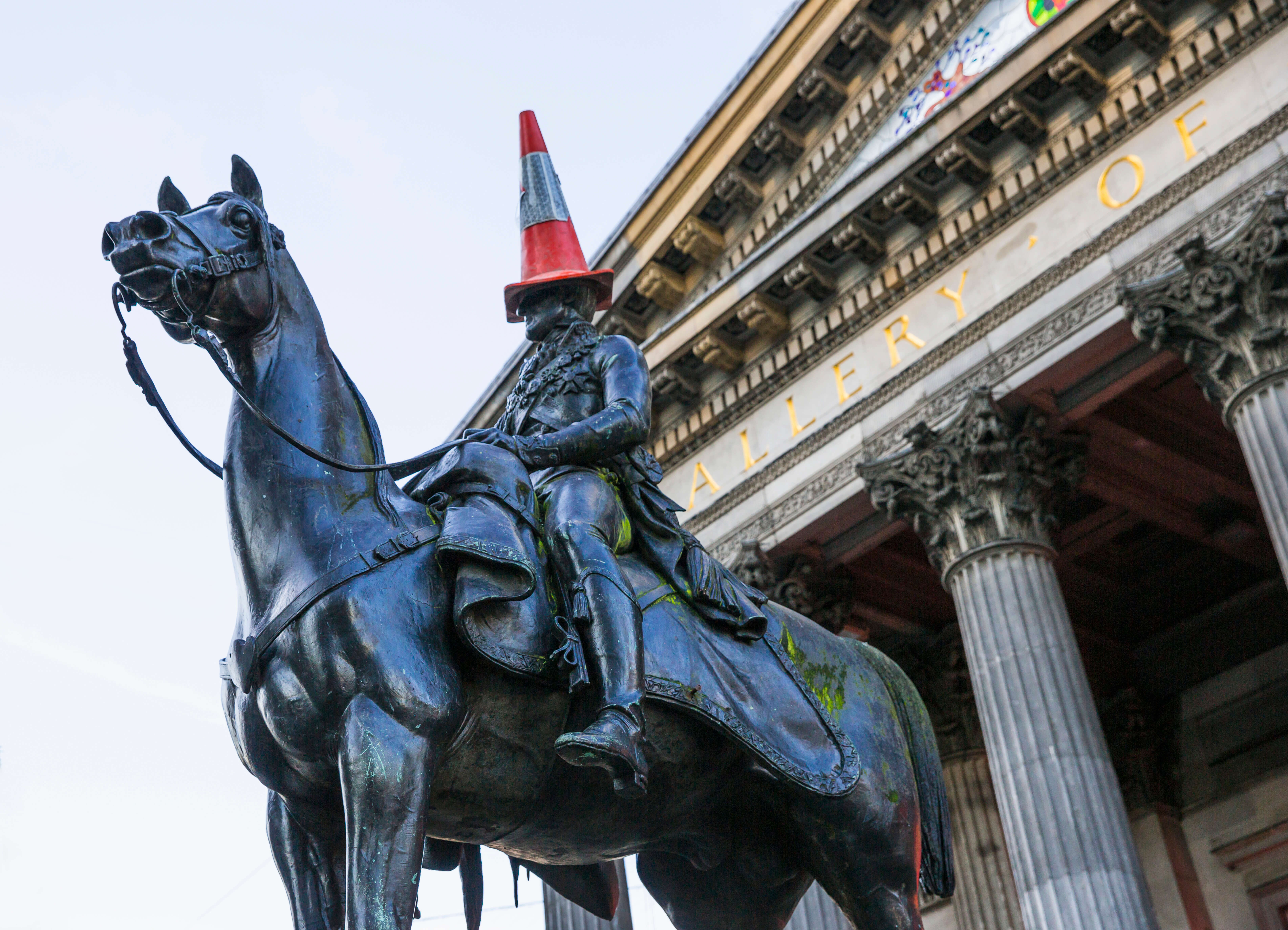 Duke of Wellington Statue outside the Glasgow Gallery of Modern Art - with his famous hat Duke of Wellington Statue outside the Glasgow Gallery of Modern Art - with his famous hat